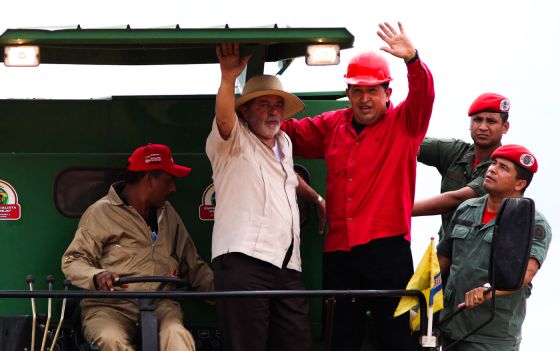 Hugo Chavez and Luiz Inacio Lula da Silva visit a soy farm in El Tigre in Venezuela’s Anzoategui state, Oct. 30, 2009. Ariana Cubillos | AP